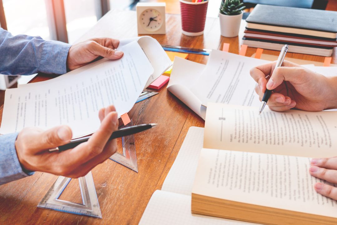 parent and tutor discussing academic progress