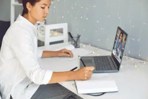 Tutor teaching math concepts during virtual class