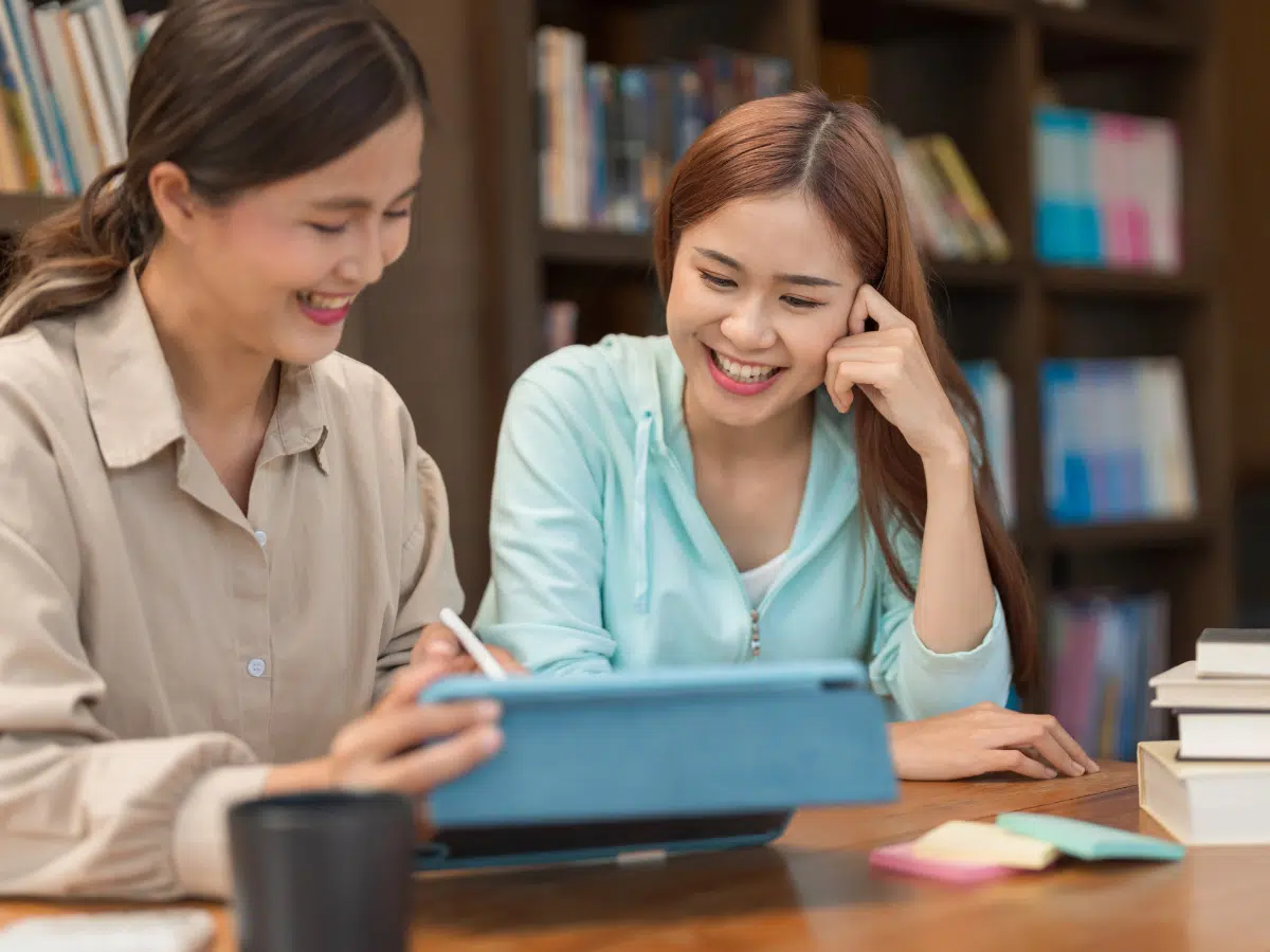 private tutoring at home with tutor helping child with schoolwork
