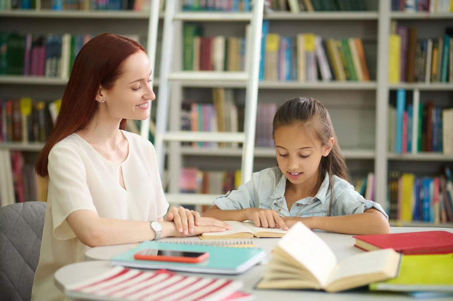 private tutoring lesson with tutor guiding student during study session
