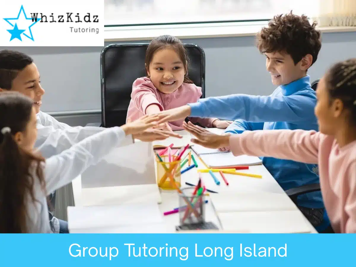 Children high-fiving at a WhizKidz group tutoring session